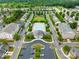 An aerial view of the community pool, common areas, and surrounding neighborhood at 4848 Fonthill Ln, Charlotte, NC 28210