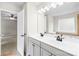 Bathroom featuring double vanity, modern fixtures, and a separate tub at 4848 Fonthill Ln, Charlotte, NC 28210