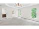 Spacious main bedroom featuring tray ceiling, natural light, ensuite and walk-in closet at 4848 Fonthill Ln, Charlotte, NC 28210