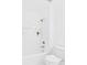 Clean bathroom features a white tub with shower, neutral-toned tile, and a modern toilet at 4905 Chestnut Lake Dr, Charlotte, NC 28227
