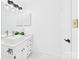 Bright bathroom featuring a modern vanity, sleek hardware, and a stylish rectangular sink at 4905 Chestnut Lake Dr, Charlotte, NC 28227