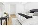 Bright bedroom features a stylish bed with a black throw and cozy decor at 4905 Chestnut Lake Dr, Charlotte, NC 28227