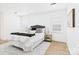 Inviting bedroom with a plush bed, soft lighting, and neutral decor at 4905 Chestnut Lake Dr, Charlotte, NC 28227