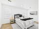 Calm bedroom with a plush bed, side tables, and comfortable decor at 4905 Chestnut Lake Dr, Charlotte, NC 28227