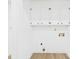 Clean, bright laundry room with overhead cabinets and modern hookups at 4905 Chestnut Lake Dr, Charlotte, NC 28227