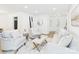 Inviting living room showcasing modern decor, neutral tones, comfortable seating, and plenty of natural light at 4905 Chestnut Lake Dr, Charlotte, NC 28227