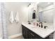 Modern bathroom featuring a double sink vanity with black fixtures and a tiled shower/tub at 5215 Star Magnolia Ct, Clover, SC 29710