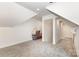 Spacious bonus room with neutral walls and carpet, offering potential for storage or customization at 5215 Star Magnolia Ct, Clover, SC 29710