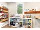 Well-organized pantry with wooden and white shelves, providing ample storage space at 5215 Star Magnolia Ct, Clover, SC 29710