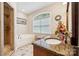 Bathroom featuring a soaking tub, walk-in shower, and a granite vanity countertop at 5812 Morgan Park Dr, Monroe, NC 28110