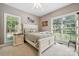 This is a cozy bedroom with lots of sunlight featuring neutral decor and carpet at 5812 Morgan Park Dr, Monroe, NC 28110