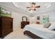 Bright bedroom featuring tray ceiling, carpet flooring, natural light and neutral colors at 5812 Morgan Park Dr, Monroe, NC 28110