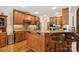 Gourmet kitchen with granite countertops, custom cabinets, and stainless steel appliances at 5812 Morgan Park Dr, Monroe, NC 28110