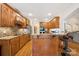 Well-equipped kitchen featuring wooden cabinets, granite countertops, and stainless steel appliances at 5812 Morgan Park Dr, Monroe, NC 28110