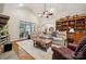 Comfortable living room with hardwood floors, vaulted ceiling, and cozy furniture at 5812 Morgan Park Dr, Monroe, NC 28110