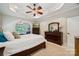 Main bedroom featuring a tray ceiling, carpet flooring, and lots of natural light at 5812 Morgan Park Dr, Monroe, NC 28110