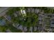 A captivating aerial view of a house nestled amongst mature trees in a quiet neighborhood at 6129 Caseys Side Way, Fort Mill, SC 29708