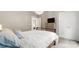 Neutral bedroom with wooden bed frame, and closet at 6129 Caseys Side Way, Fort Mill, SC 29708