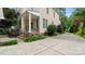 Side view of a two story home with a long driveway and a metal fence at 6129 Caseys Side Way, Fort Mill, SC 29708