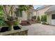 Beautiful outdoor patio with brick pavers, garden, and fountain at 6129 Caseys Side Way, Fort Mill, SC 29708