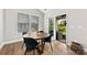 Cozy breakfast nook with access to the outdoor patio, a round table, and natural lighting at 6261 Six String Ct, Fort Mill, SC 29708