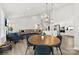 Open-concept living area with a modern kitchen, a spacious living room, and plenty of natural light at 6261 Six String Ct, Fort Mill, SC 29708