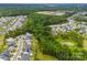 Aerial shot of neighborhood featuring a greenbelt and homes situated on large, private lots at 6261 Six String Ct, Fort Mill, SC 29708