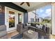 Relaxing covered patio with comfortable seating area perfect for outdoor lounging at 6261 Six String Ct, Fort Mill, SC 29708