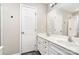 Bathroom with a dual sink vanity and large mirror at 6922 Cascade Dream Ct, Huntersville, NC 28078