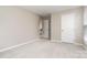 Bright and spacious bedroom with natural light and closet at 6922 Cascade Dream Ct, Huntersville, NC 28078