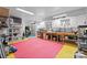 Clean garage space with workbench, tool storage, and ample room for projects at 7412 Sahalee Dr, Denver, NC 28037