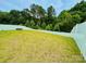 Expansive backyard featuring a well-maintained lawn, a privacy fence, and a fire pit at 750 Fraternity Row, Kannapolis, NC 28081