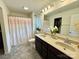 Bathroom featuring dual sinks, granite countertops, and modern fixtures at 750 Fraternity Row, Kannapolis, NC 28081