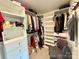 Organized walk-in closet with built-in shelving and ample storage space at 750 Fraternity Row, Kannapolis, NC 28081