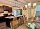 Open concept kitchen and dining area with stairs in background at 750 Fraternity Row, Kannapolis, NC 28081