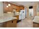 An open kitchen featuring granite counters, wood cabinets and stainless steel appliances at 8008 Alba Ct, Charlotte, NC 28269