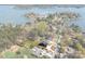A high altitude view of the property and outlining it's borders, revealing its location near a serene lake at 8039 Mcconnell Rd, Denver, NC 28037