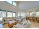 Bright living room with large windows and open kitchen concept at 8039 Mcconnell Rd, Denver, NC 28037