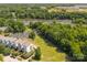 Stunning aerial view of riverfront homes, community parking, and lush green space at 807 Herrons Ferry Rd, Rock Hill, SC 29730