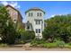 Charming three-story home with professional landscaping, fenced yard and inviting curb appeal at 807 Herrons Ferry Rd, Rock Hill, SC 29730