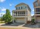 Two-story home featuring a screened porch above the garage and landscaped front yard at 807 Herrons Ferry Rd, Rock Hill, SC 29730