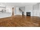 Spacious open living area with hardwood floors connecting the kitchen, living room, and staircase at 807 Herrons Ferry Rd, Rock Hill, SC 29730