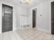 Inviting mudroom featuring a hall tree with bench seating, perfect for organization at 807 Herrons Ferry Rd, Rock Hill, SC 29730