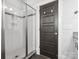 Modern bathroom with a glass-enclosed shower, showcasing the tile work and updated fixtures at 807 Herrons Ferry Rd, Rock Hill, SC 29730