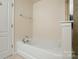 Bathroom featuring a white bathtub at 8230 Viewpoint Ln, Cornelius, NC 28031