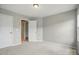 Spacious bedroom with neutral walls, carpet, and bright natural light at 8230 Viewpoint Ln, Cornelius, NC 28031