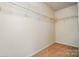 Walk-in closet with shelving for storage at 8230 Viewpoint Ln, Cornelius, NC 28031