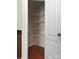 Walk-in pantry with wire shelving offers ample storage space for kitchen essentials at 8230 Viewpoint Ln, Cornelius, NC 28031