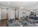 Cozy living room featuring modern decor, plush seating, and stylish lighting fixtures at 85 Ruritan Park Rd, Stony Point, NC 28678