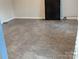 Finished basement area with durable flooring, perfect for recreation or storage at 936 New Camp Creek Church Rd # 11, Kings Mountain, NC 28086